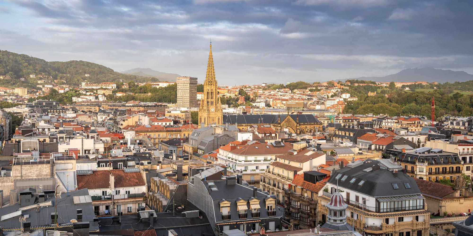 a city with many buildings and a tall tower
