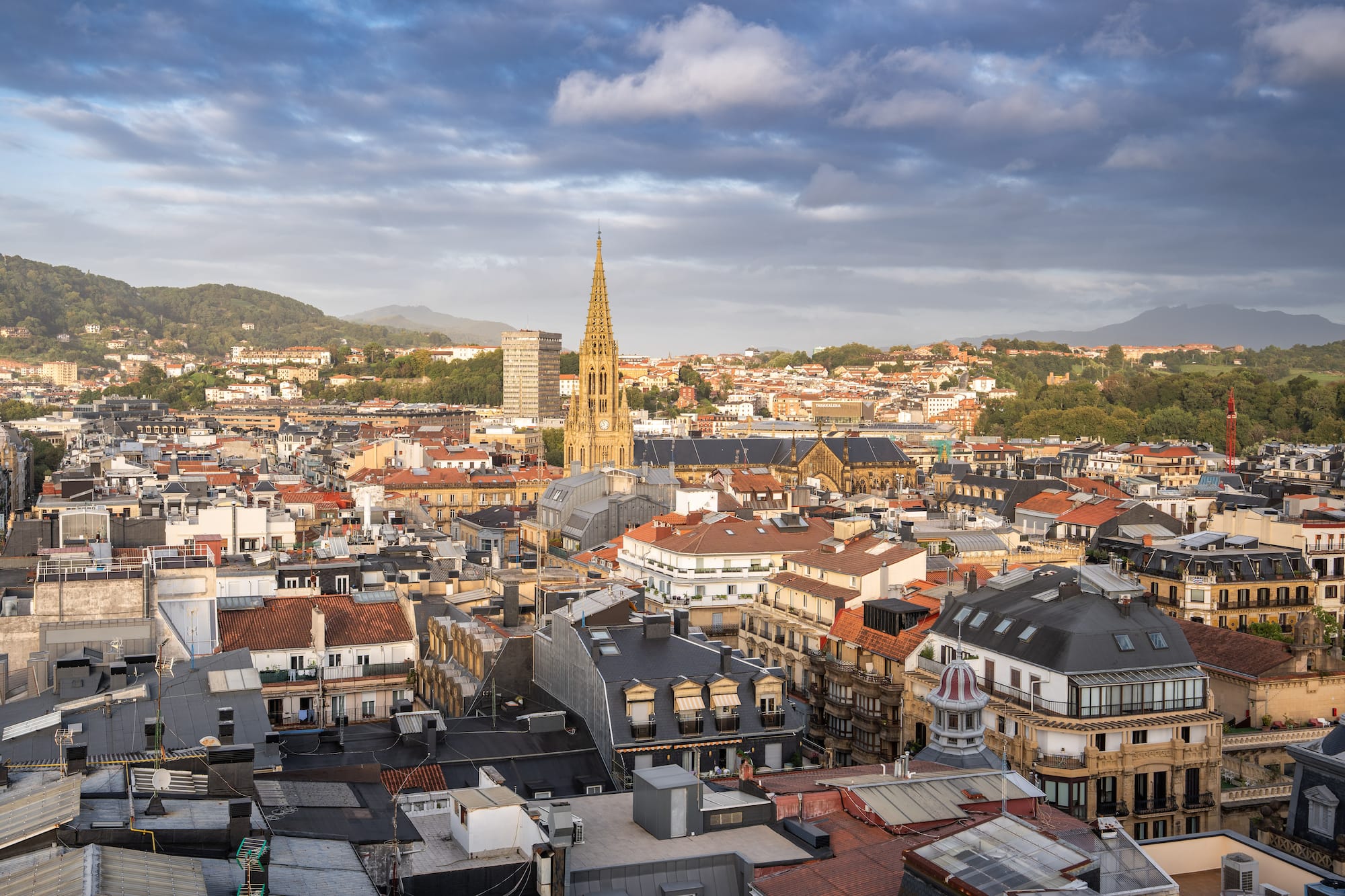 a city with many buildings and a tall tower