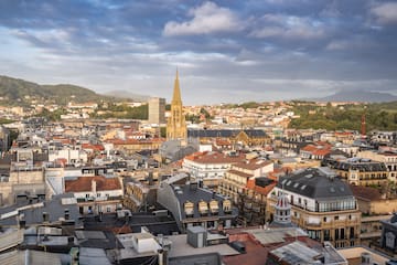 a city with many buildings and a tall tower