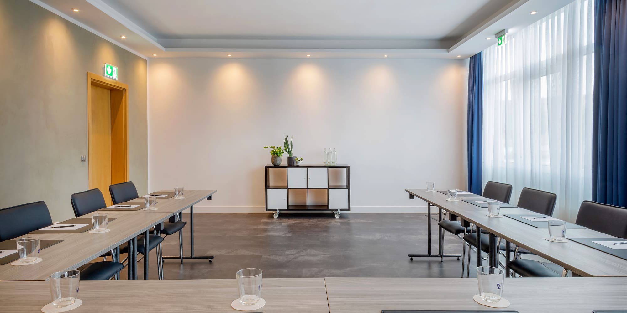 a room with tables and chairs