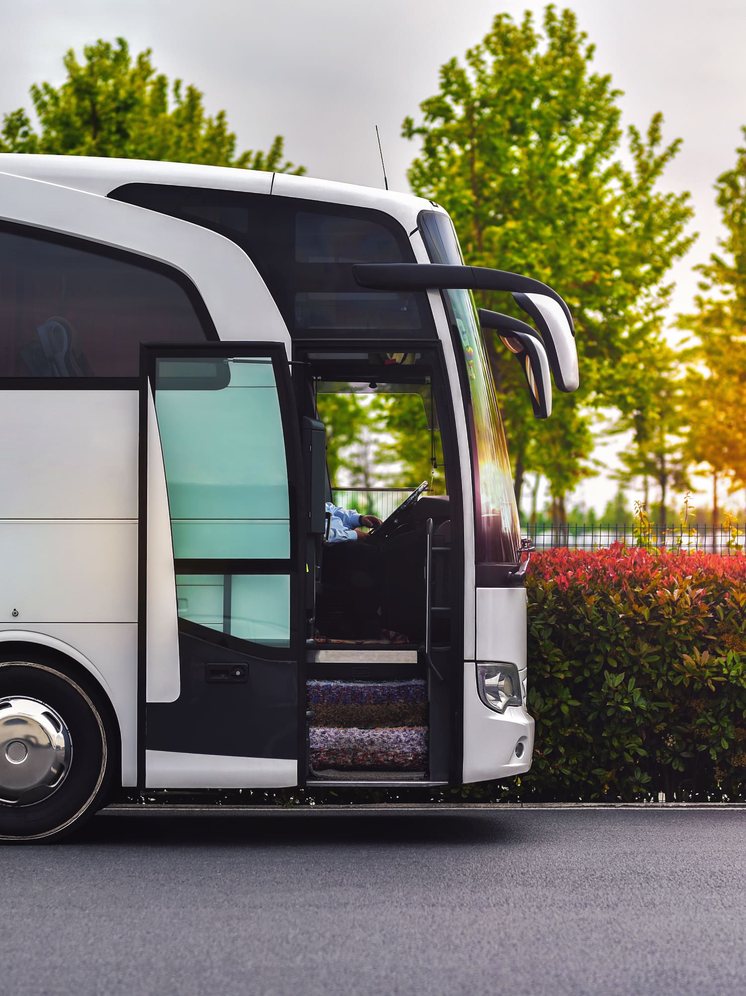 a white bus with the door open