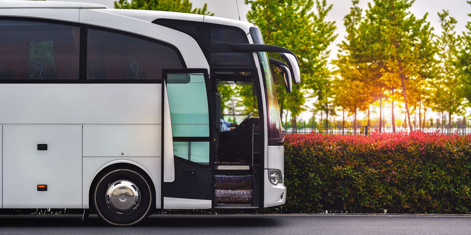 a white bus with the door open