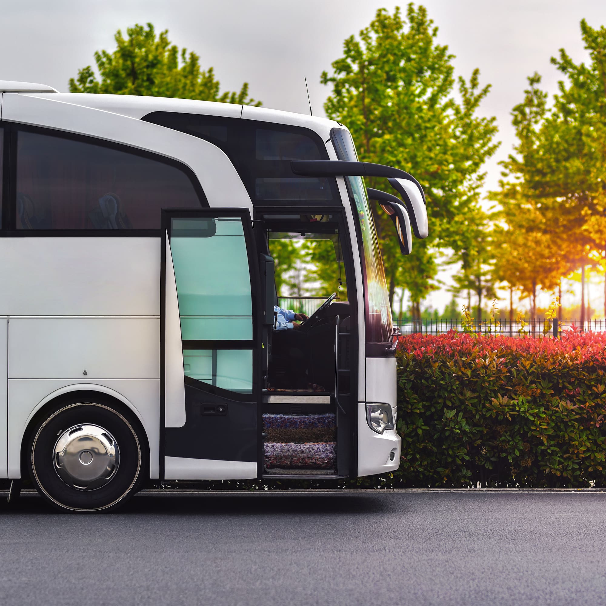 a white bus with the door open