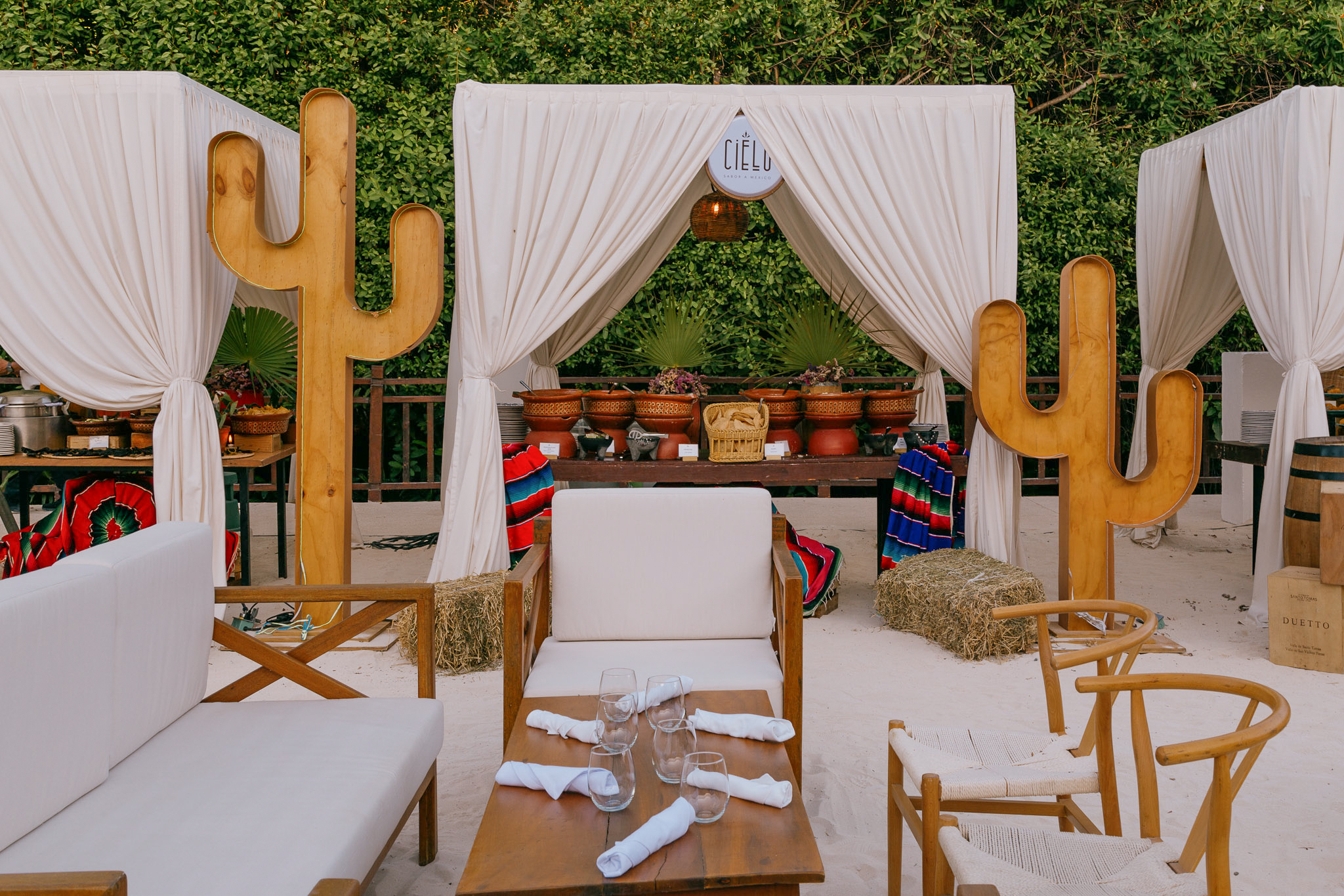 a table and chairs in a desert setting