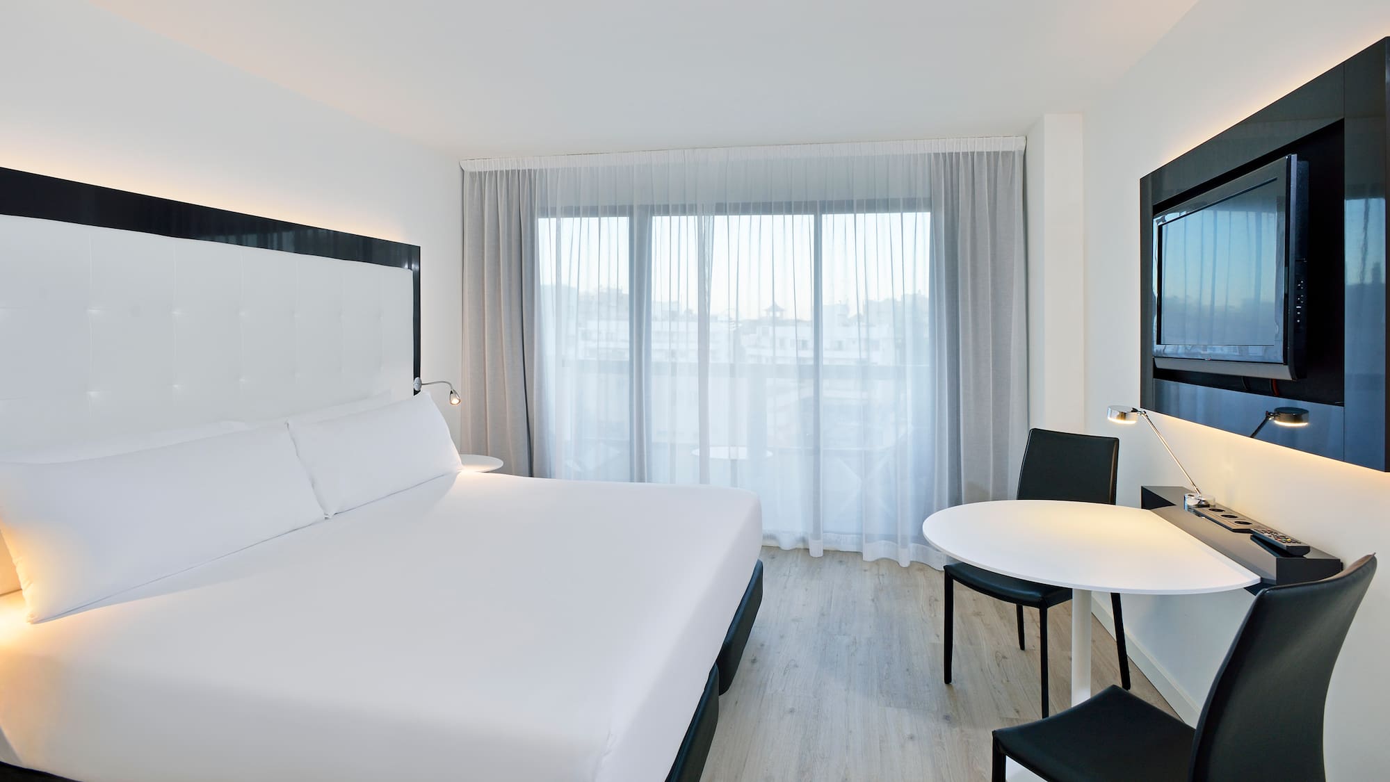 a room with a bed and a table