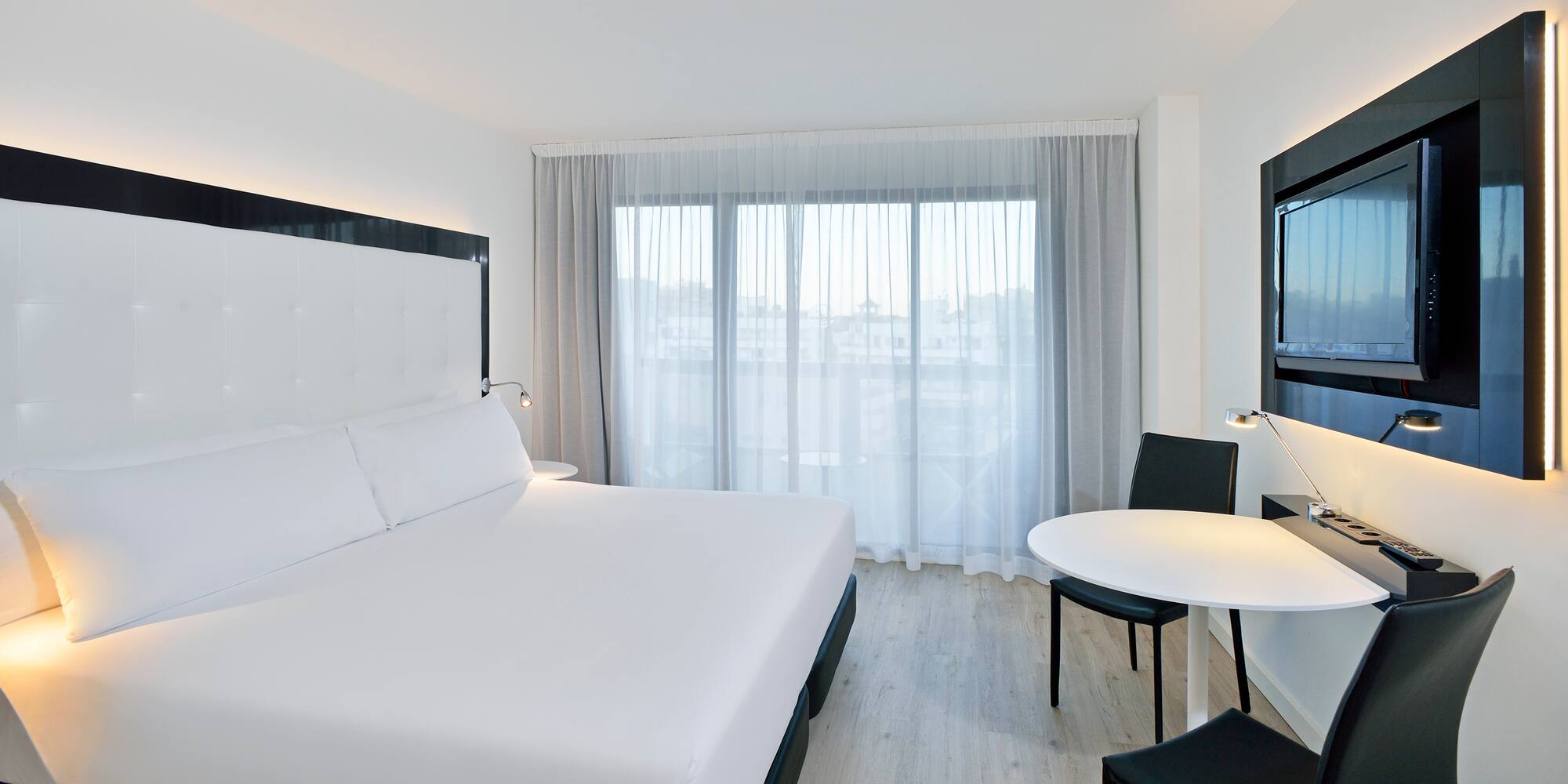 a room with a bed and a table