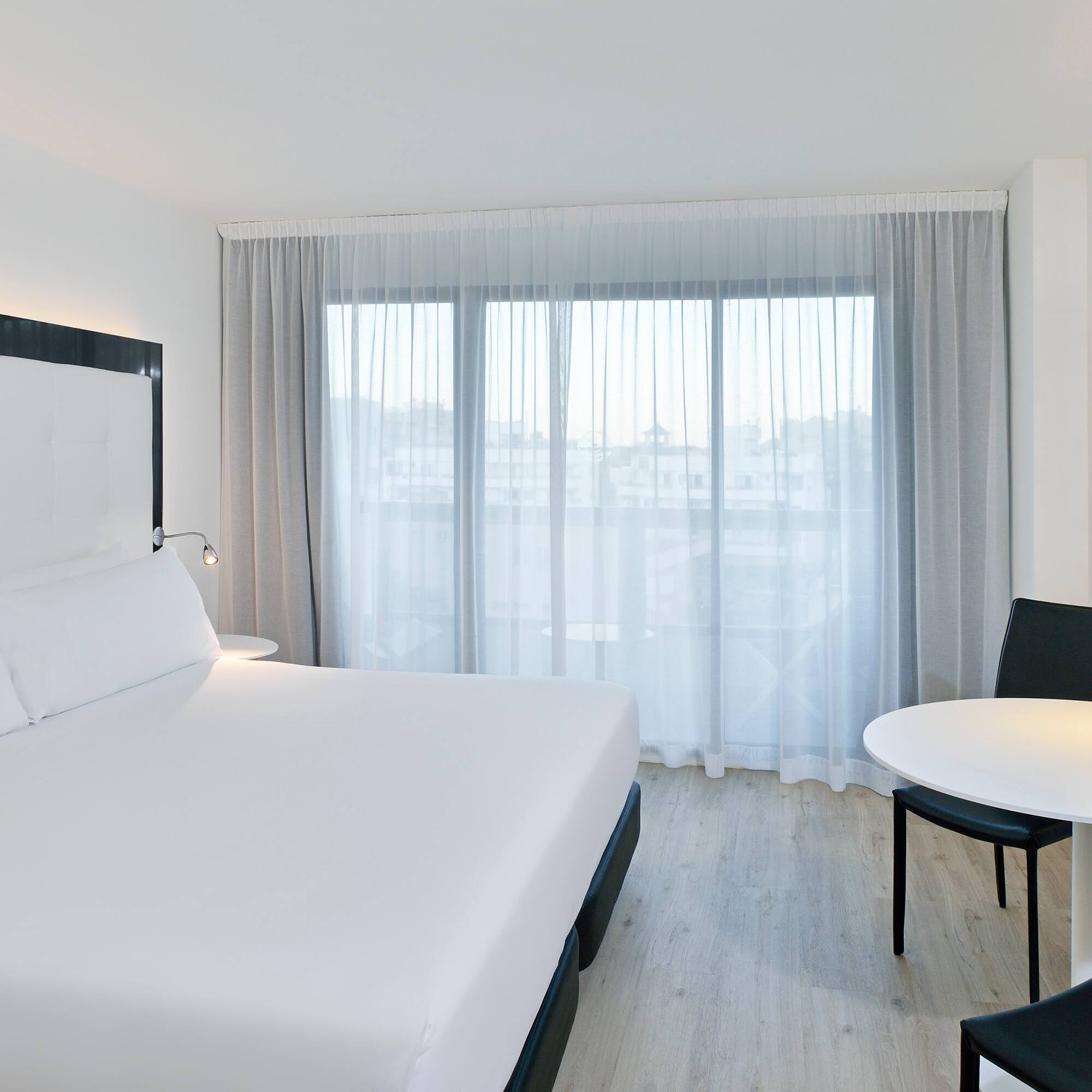 a room with a bed and a table