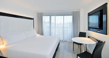 a room with a bed and a table