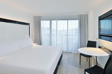 a room with a bed and a table