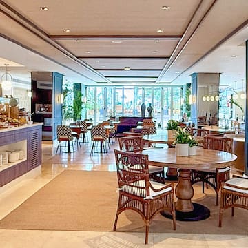 a room with a table and chairs