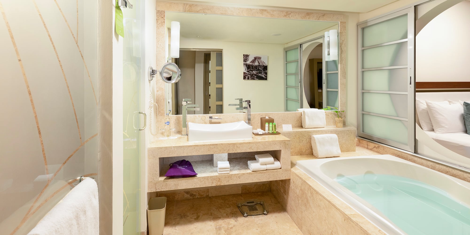 a bathroom with a tub and a mirror