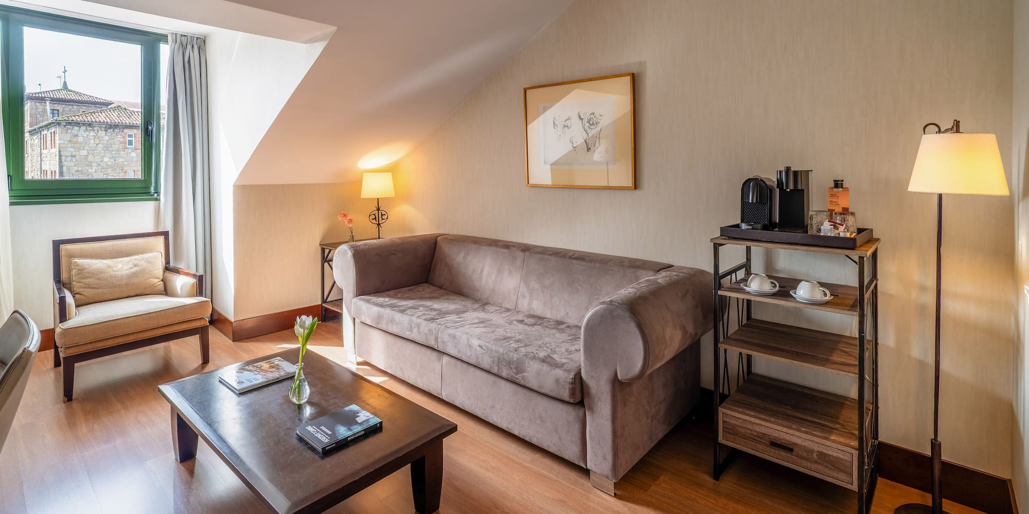 a living room with a couch and coffee table