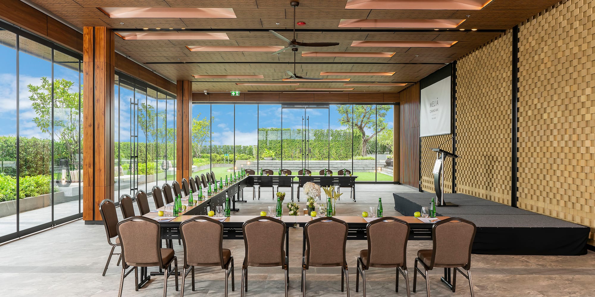 a room with a large table and chairs