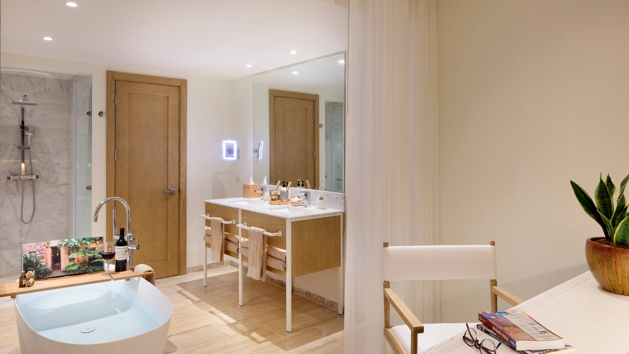 a bathroom with a white tub and a white table