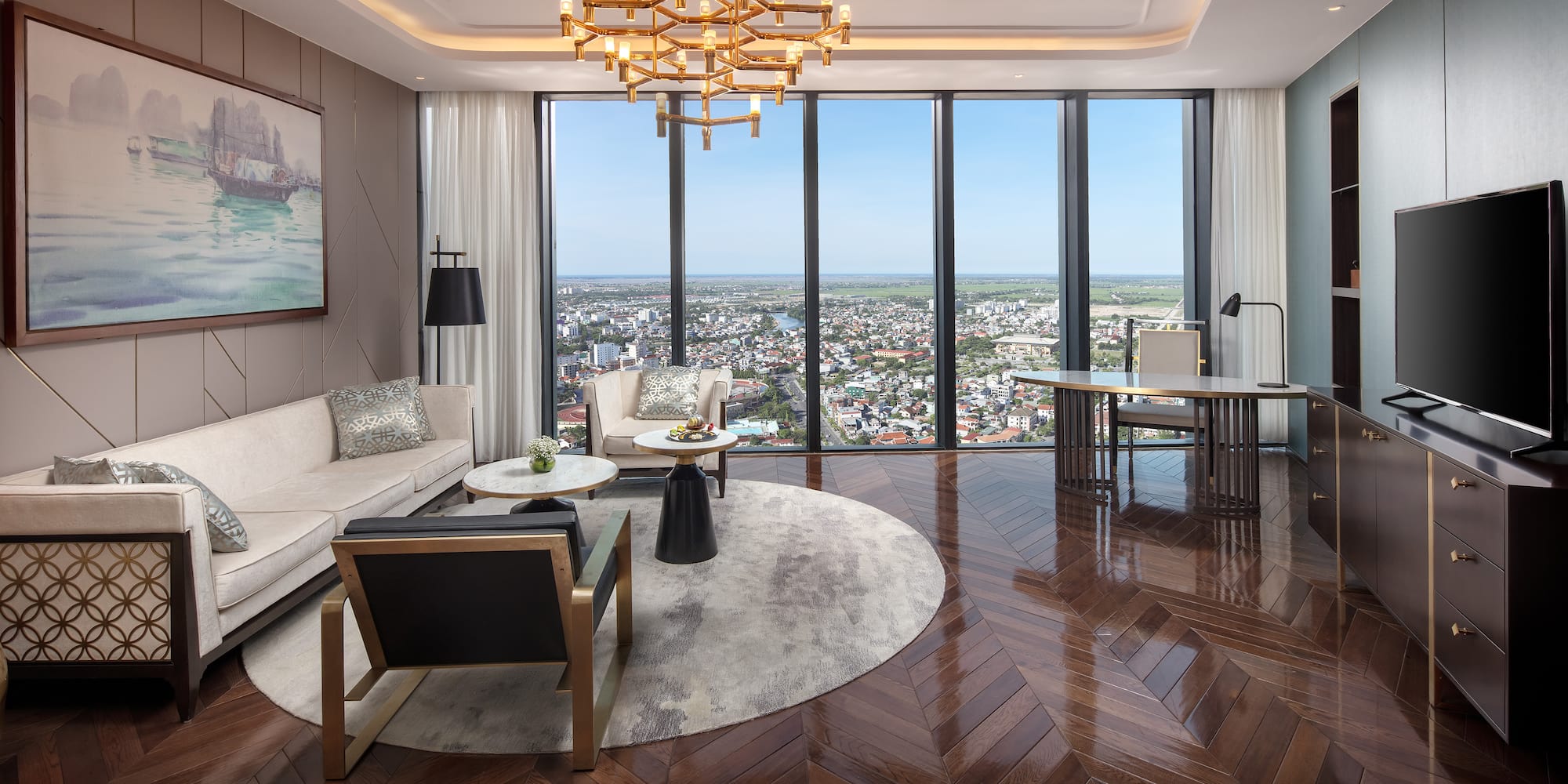 a living room with a view of a city