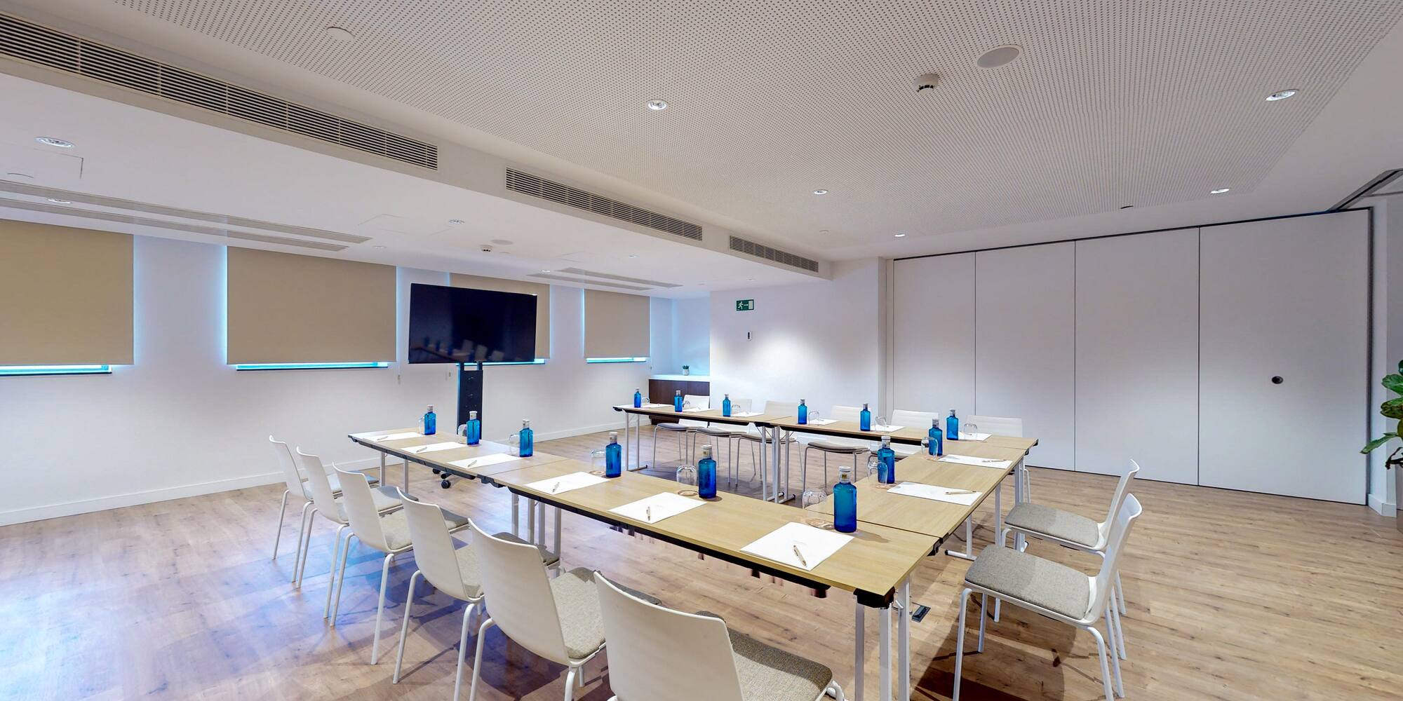 a room with tables and chairs