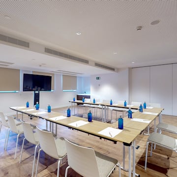 a room with tables and chairs