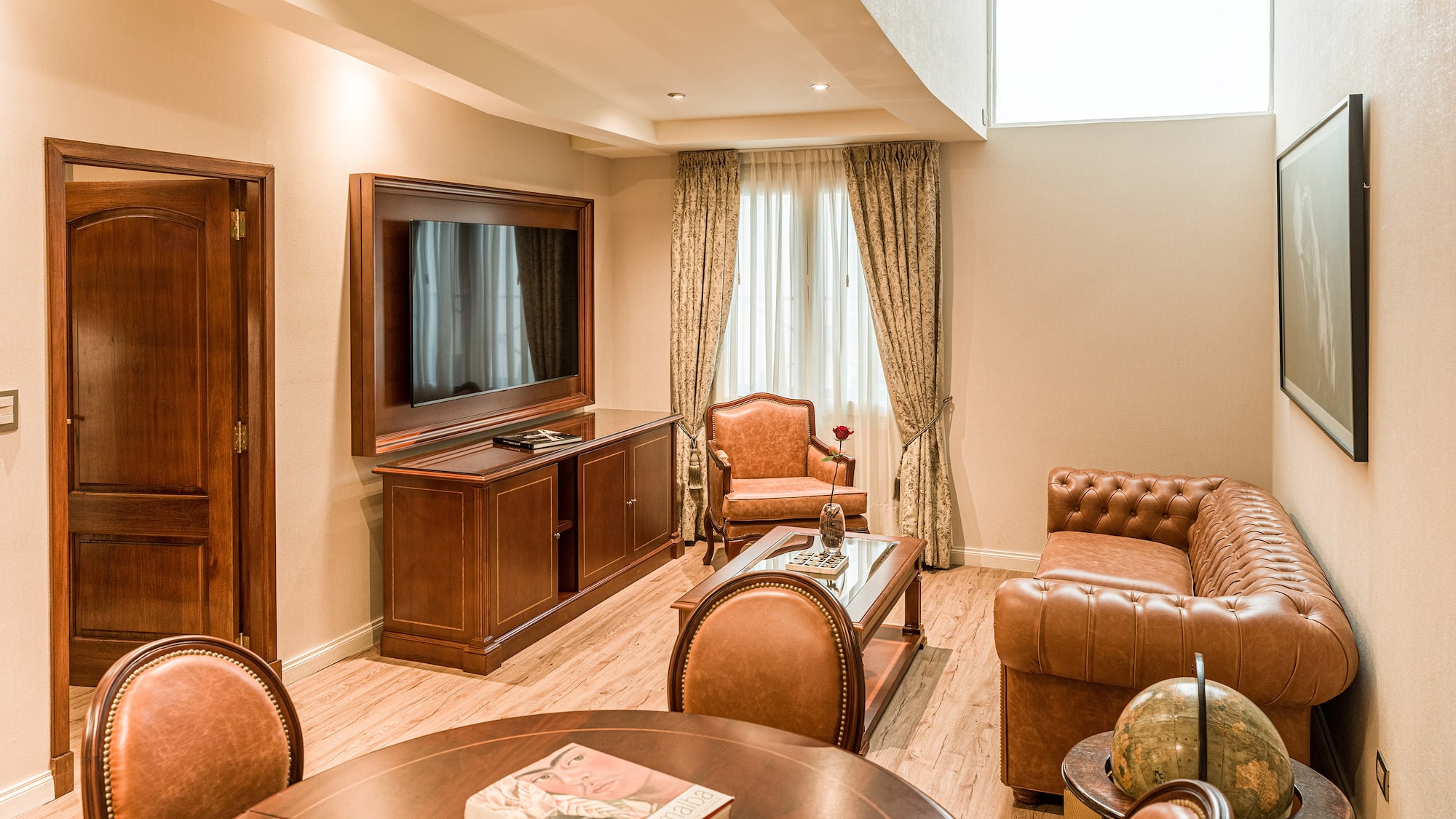 a room with a television and couches