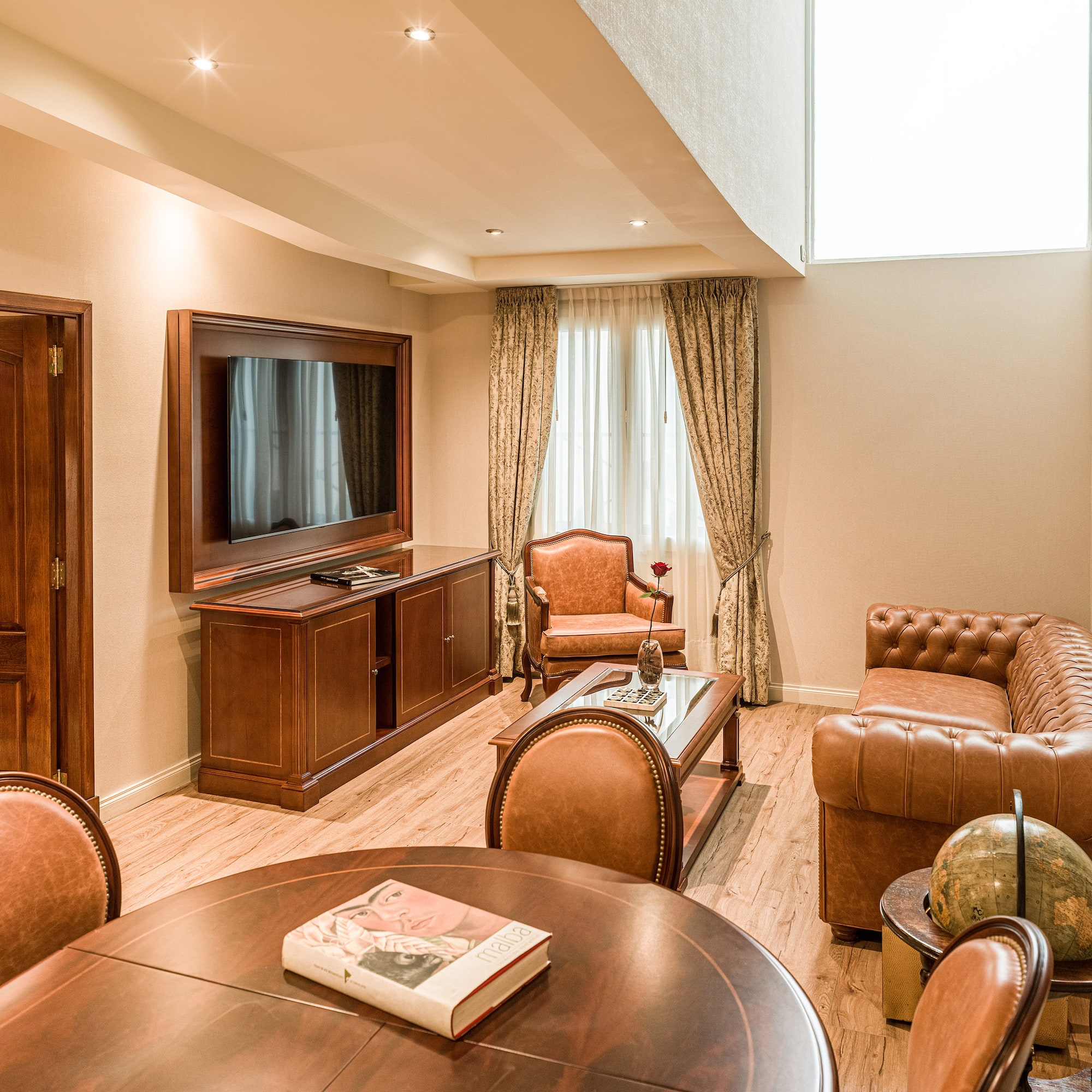 a room with a television and couches