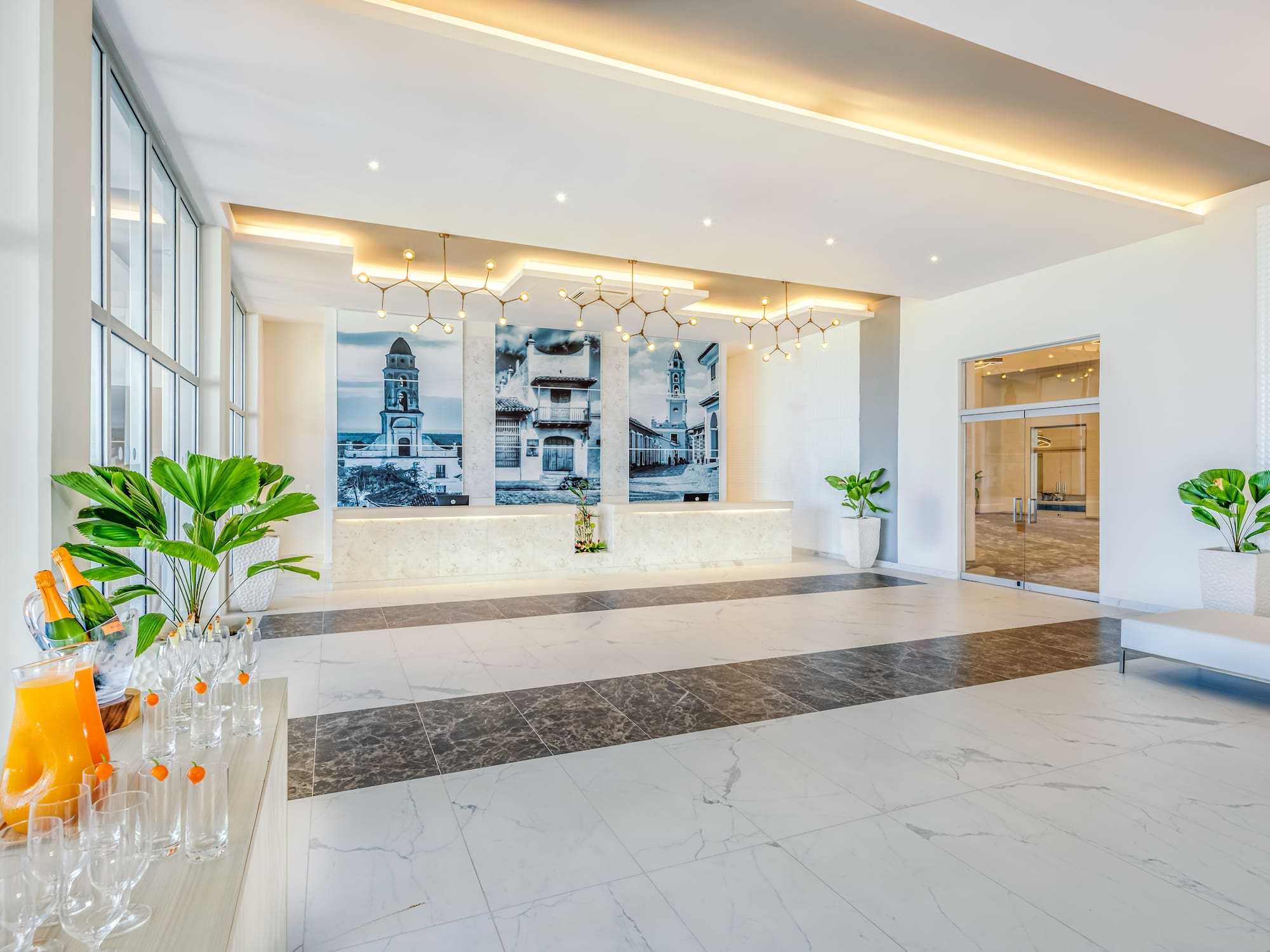 a large room with a large window and a wall of glass