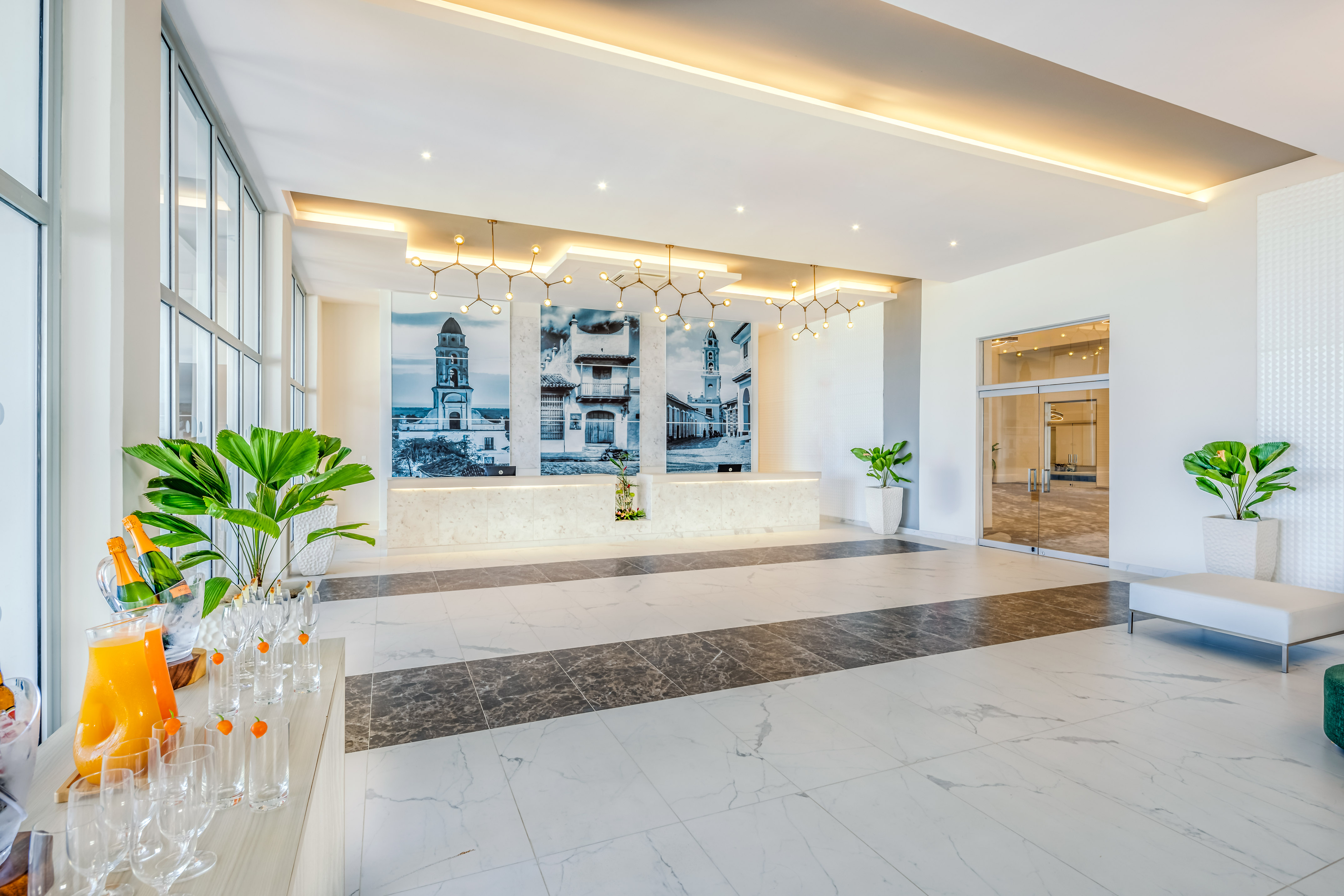 a large room with a large window and a wall of glass