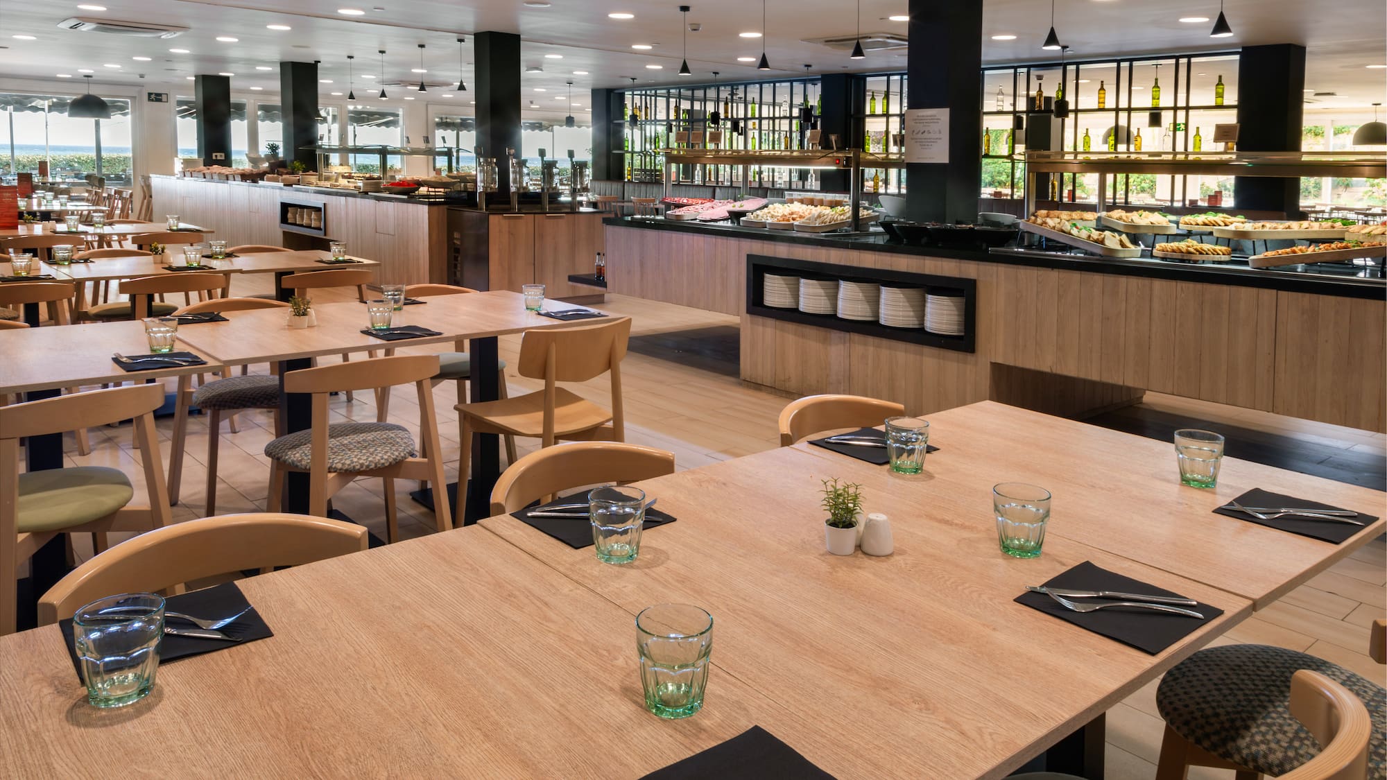 a restaurant with tables and chairs