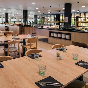 a restaurant with tables and chairs