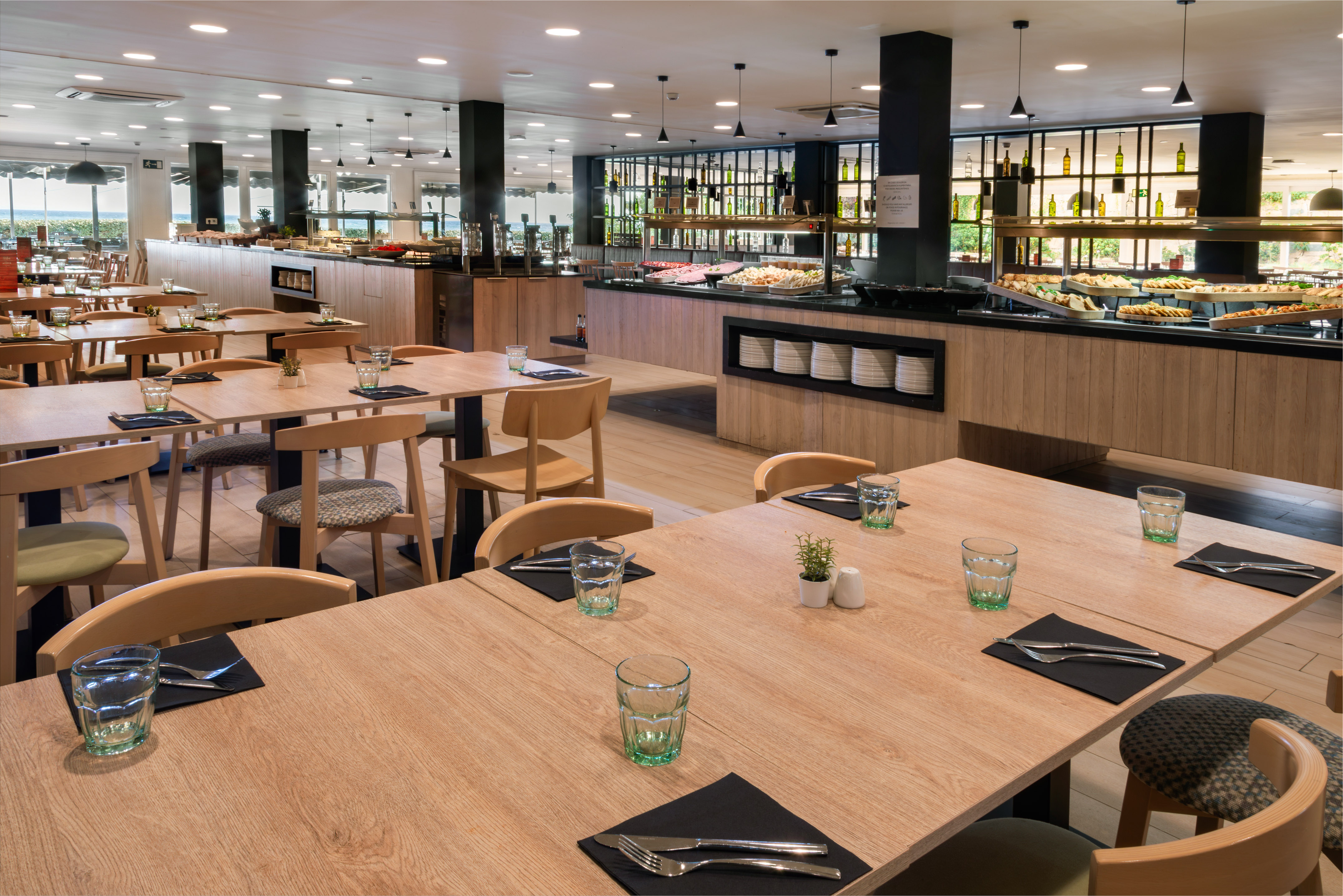 a restaurant with tables and chairs