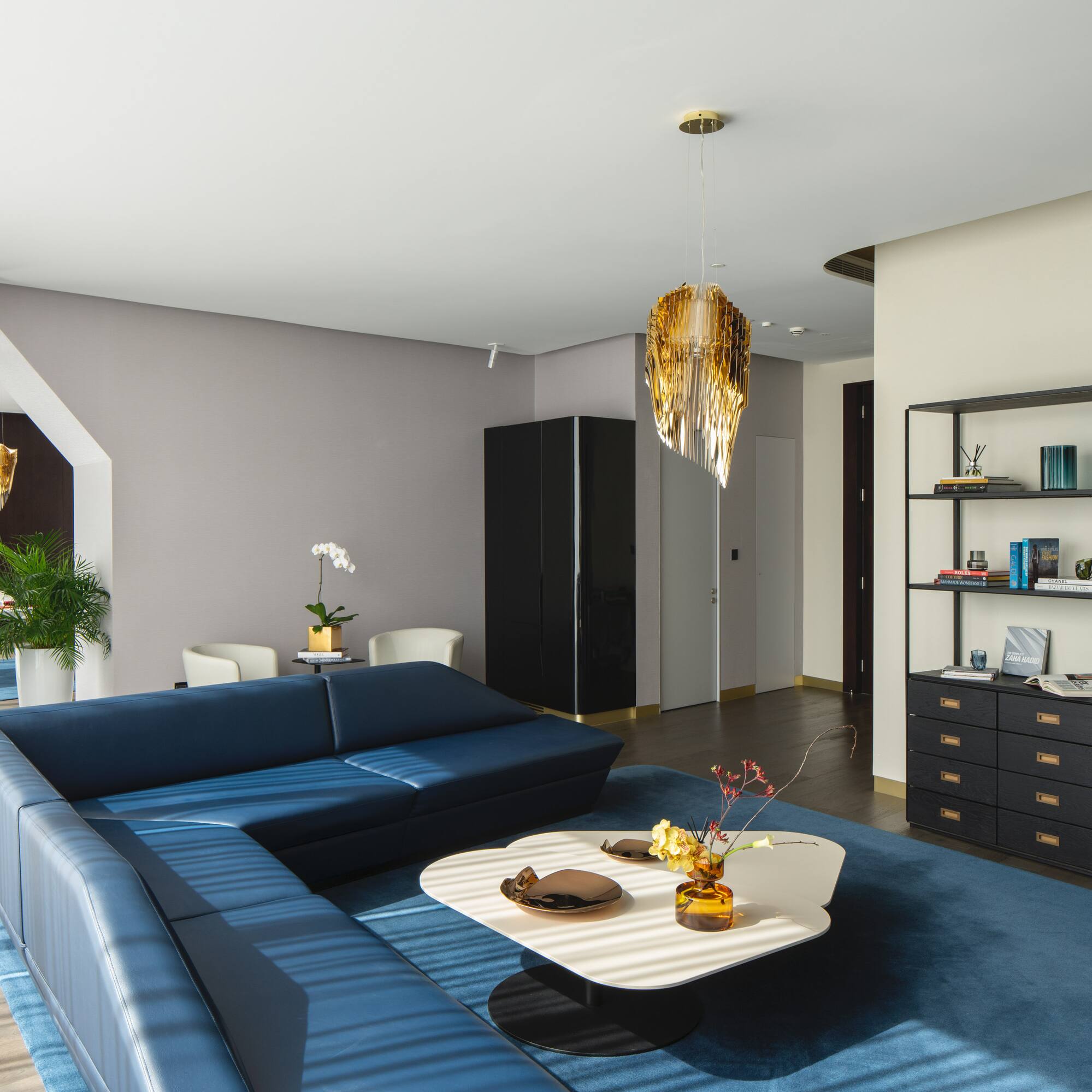 a living room with a couch and a table