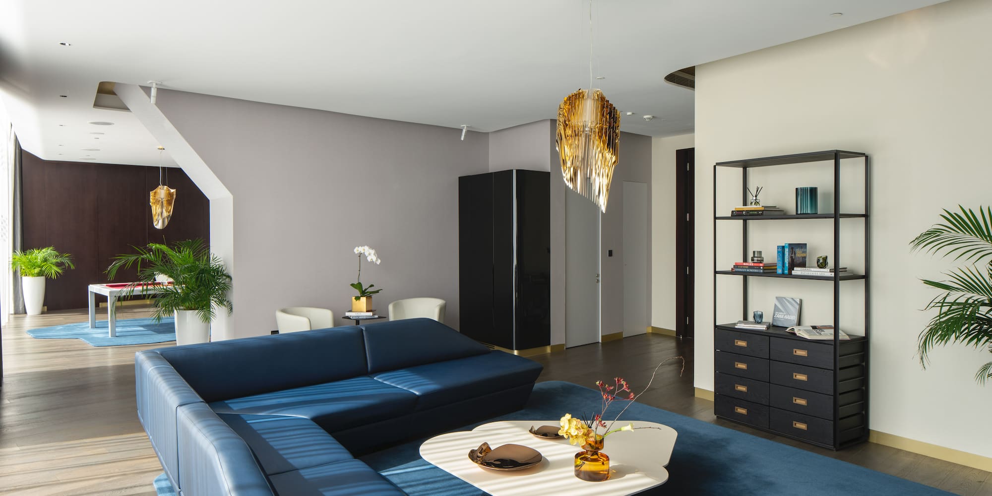 a living room with a couch and a table