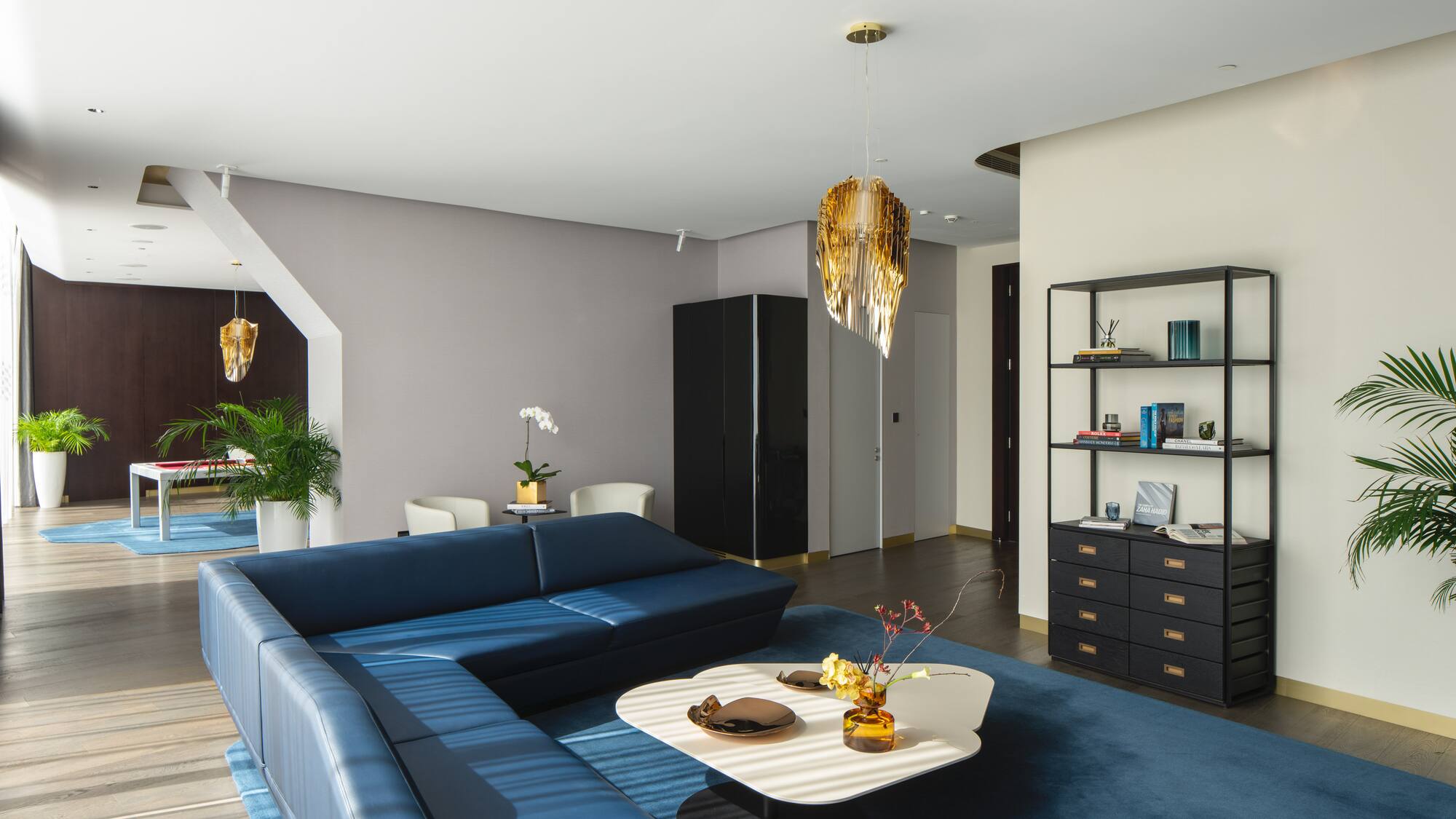 a living room with a couch and a table