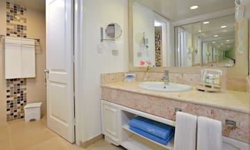 a bathroom with a sink and mirror