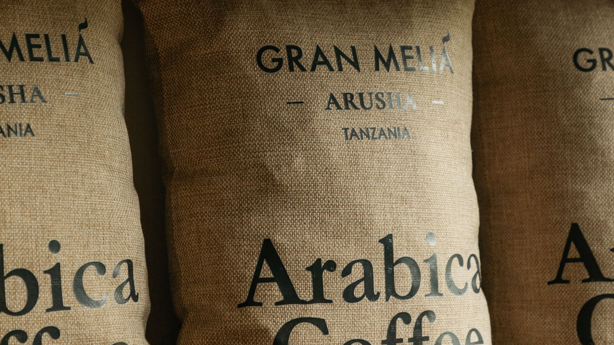 sacks with black text on them