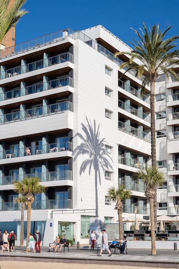 a building with palm trees