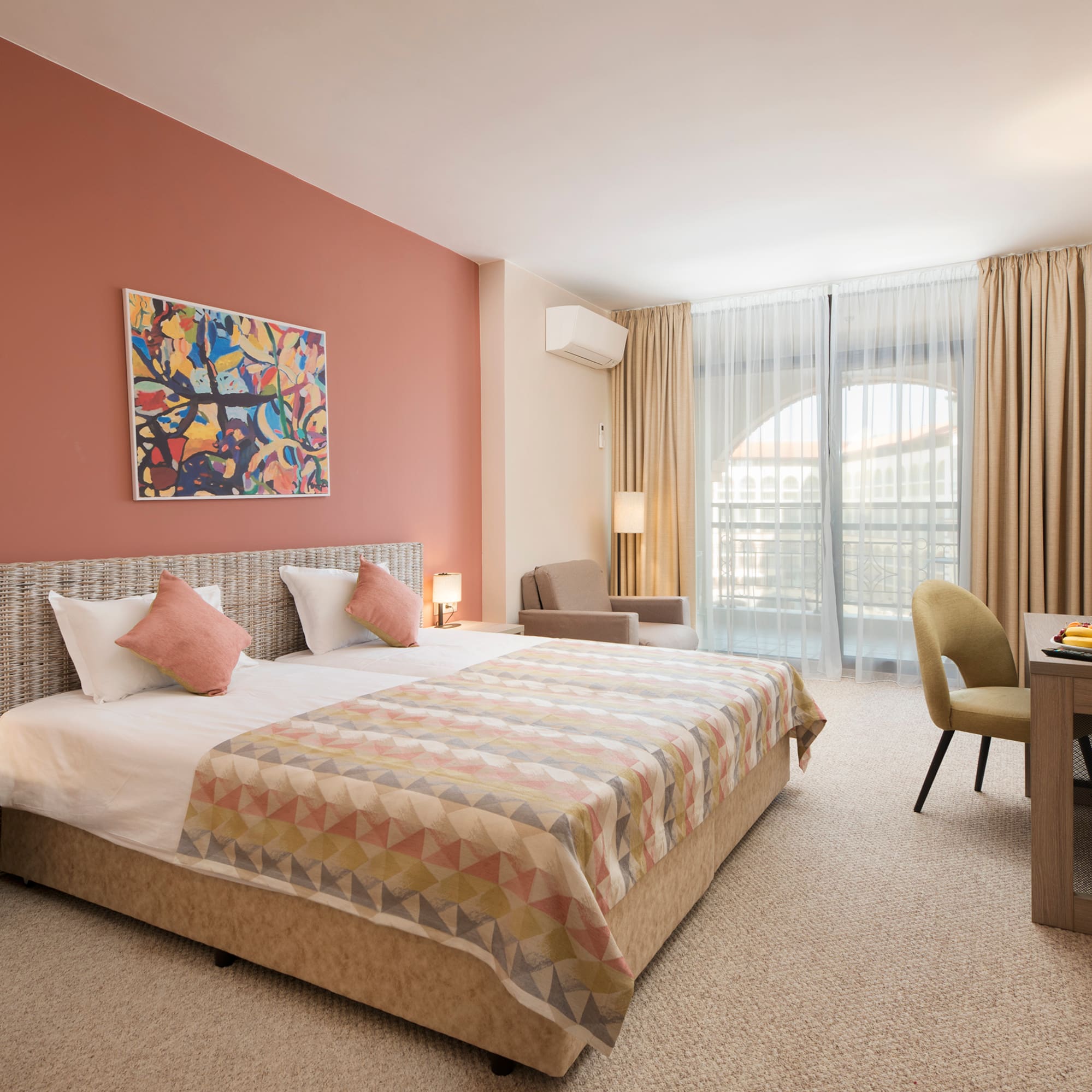 a room with a bed and a desk