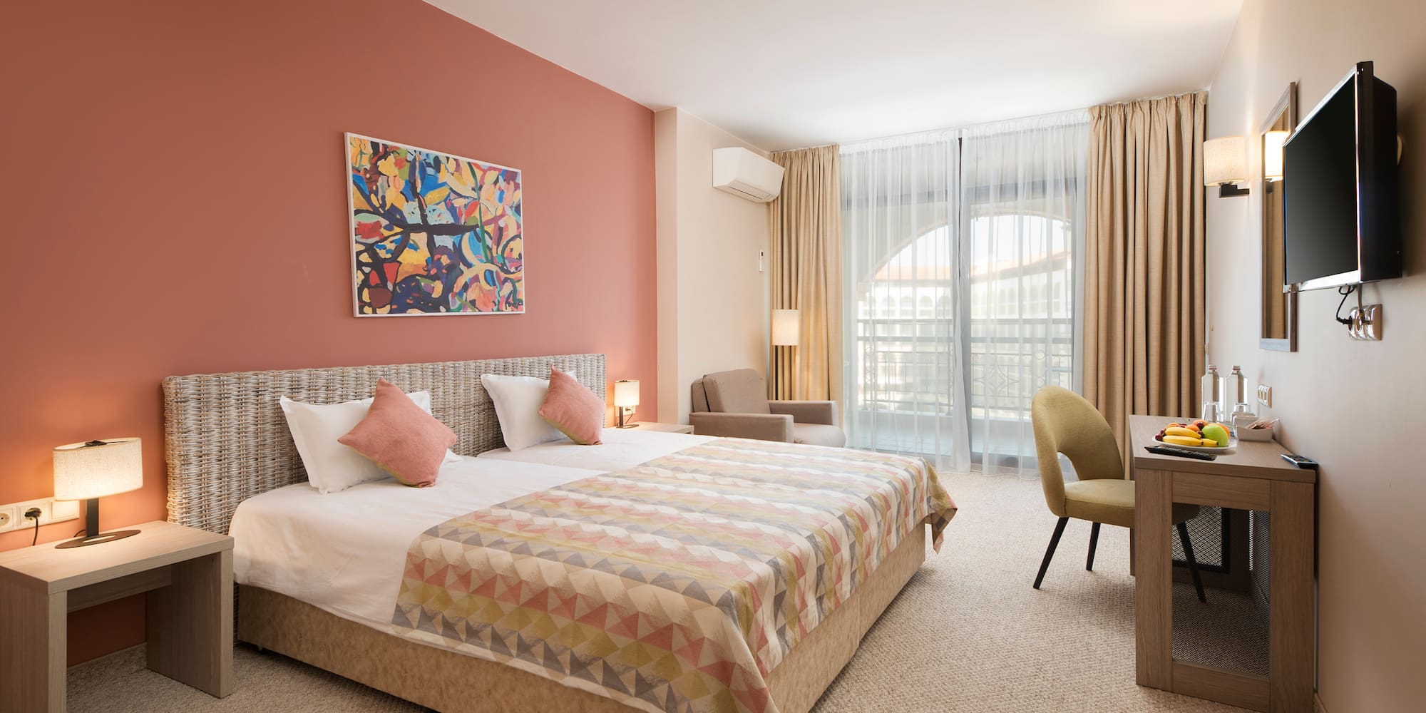 a room with a bed and a desk