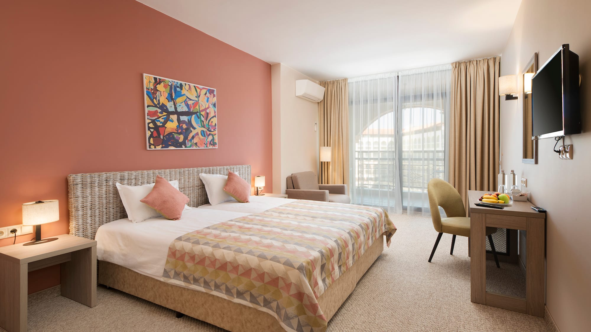 a room with a bed and a desk