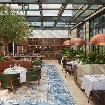 a restaurant with tables and chairs