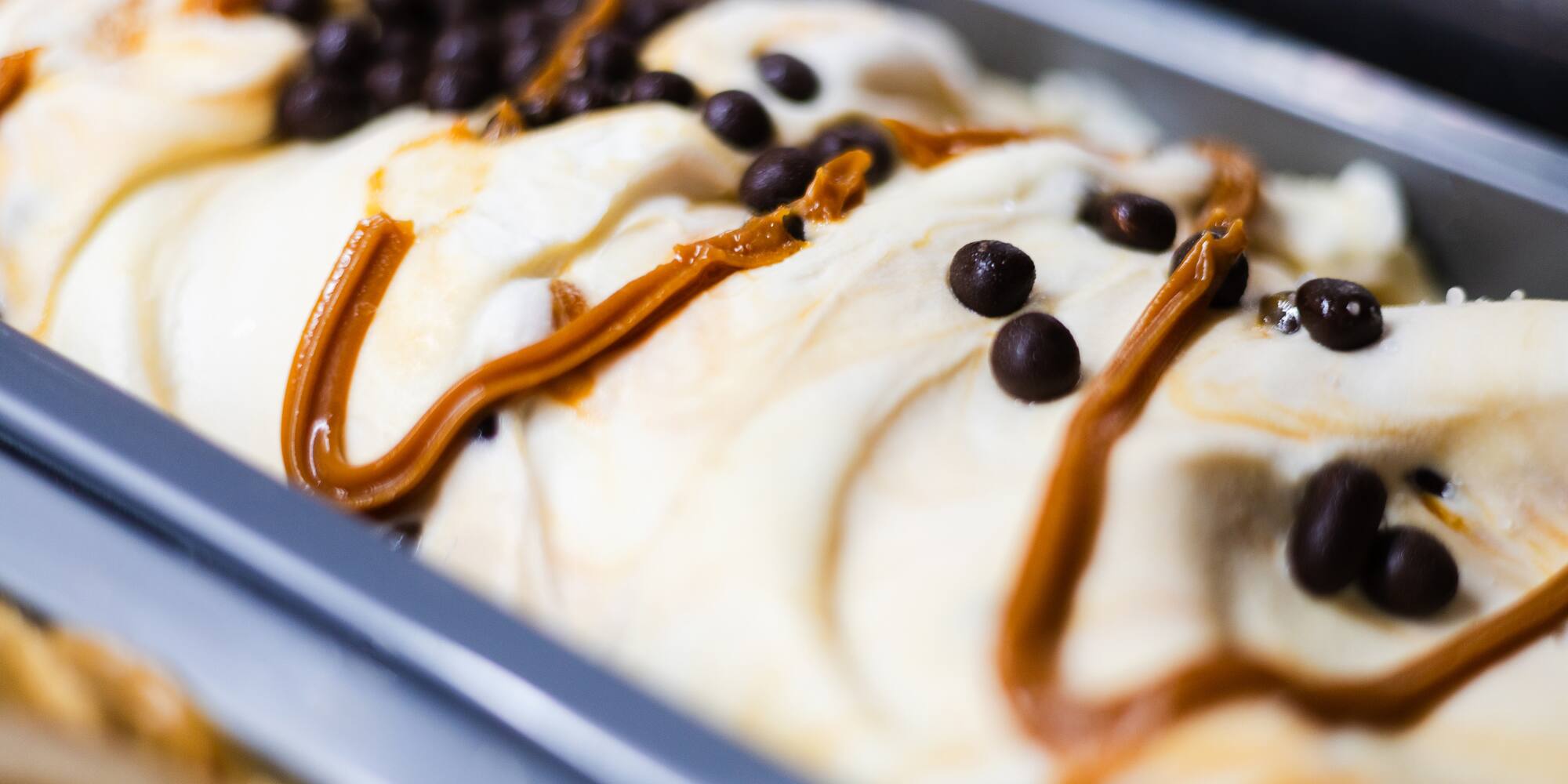 Vanilla gelato swirled with caramel and dark chocolate chips.