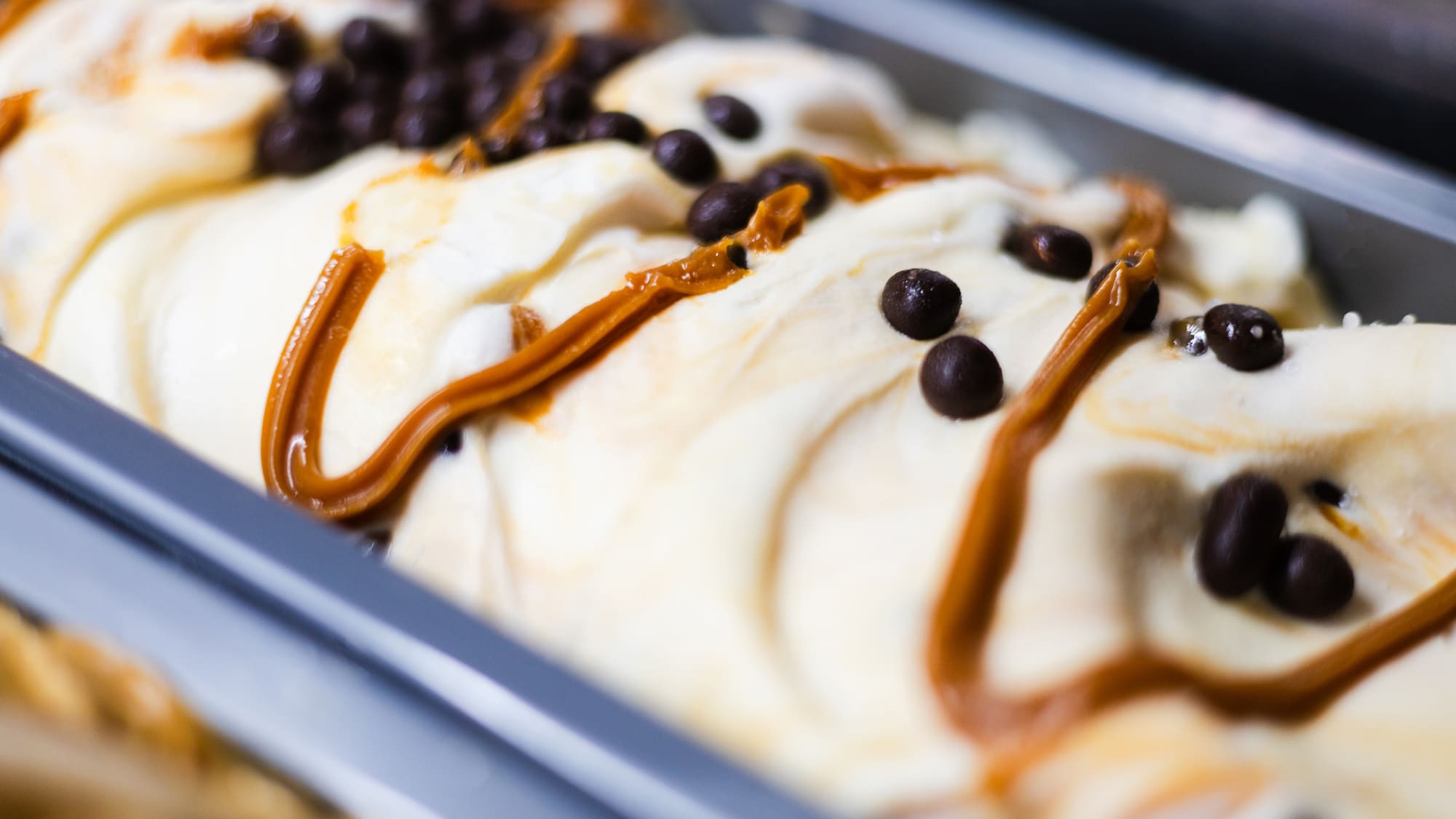 Vanilla gelato swirled with caramel and dark chocolate chips.