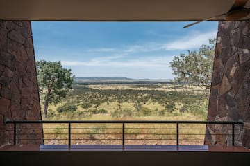 a view of a landscape from a balcony