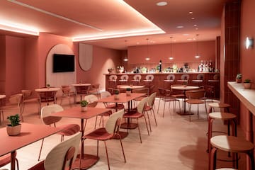 a room with tables and chairs