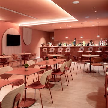 a room with tables and chairs