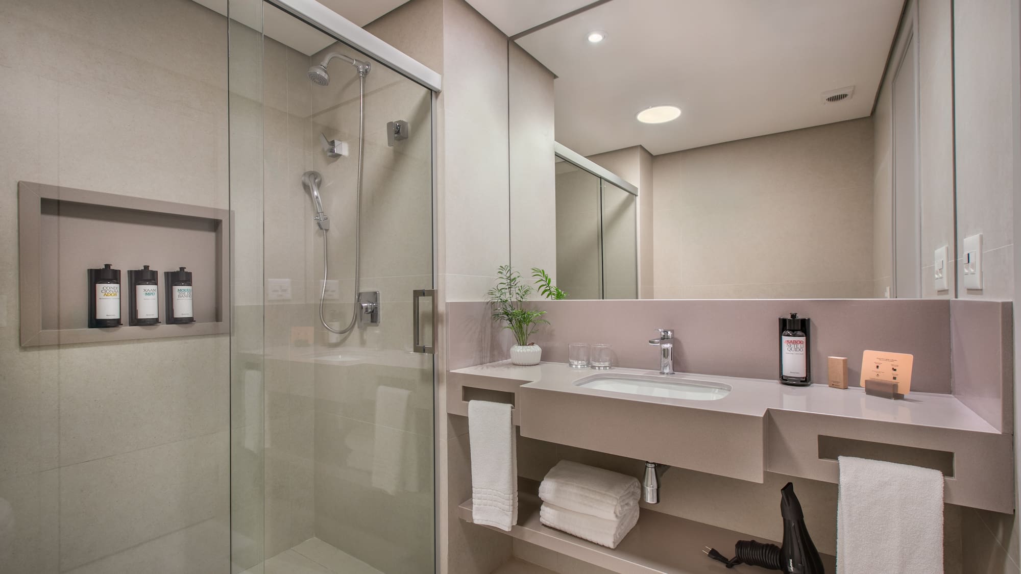 a bathroom with a shower and sink