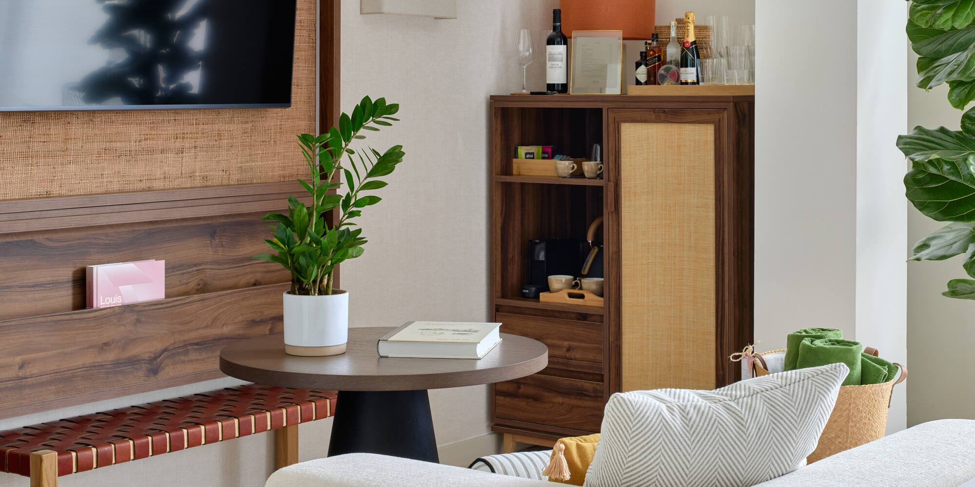 a living room with a tv and a table