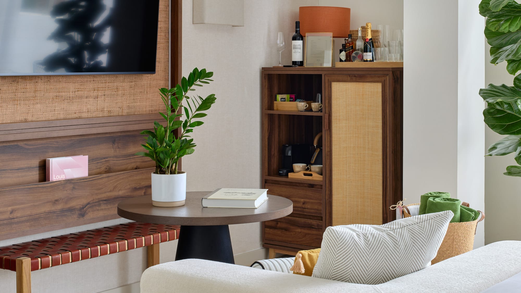 a living room with a tv and a table