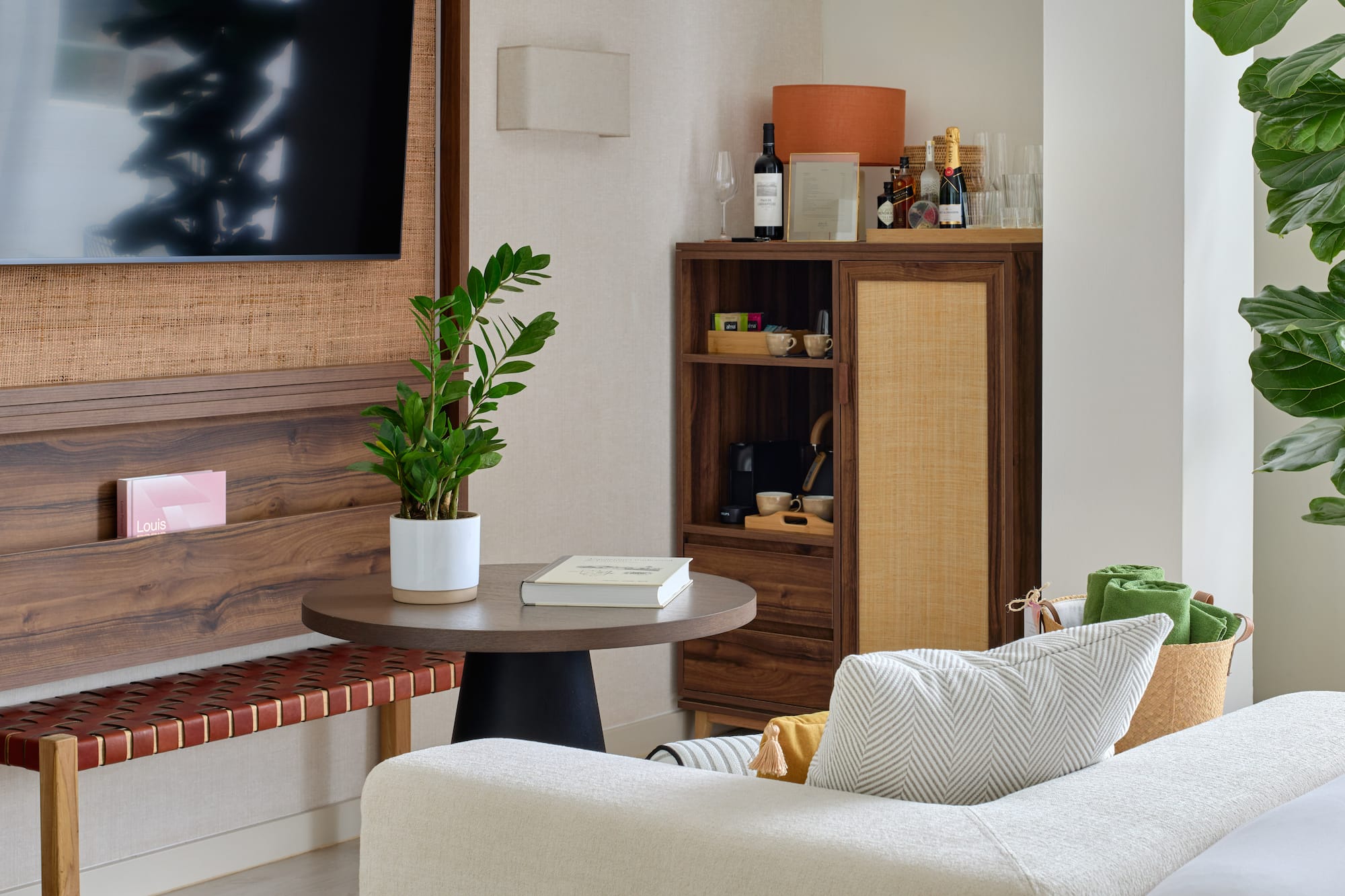 a living room with a tv and a table