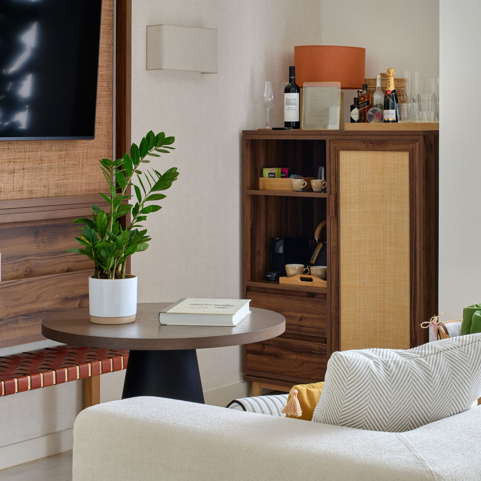 a living room with a tv and a table