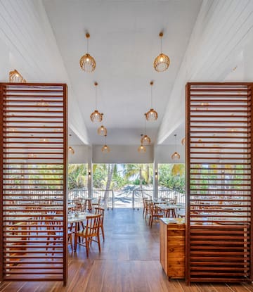 a room with tables and chairs