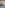 Las Arenas beach hotel with palm trees, blue sea, and mountains in Spain.